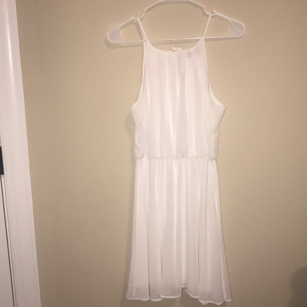 White cinched at the waist dress